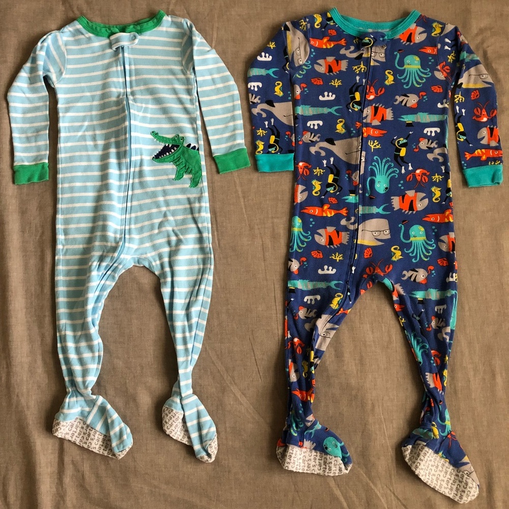 Bundle of 2 Carter’s Zip Up Footed Pajamas
